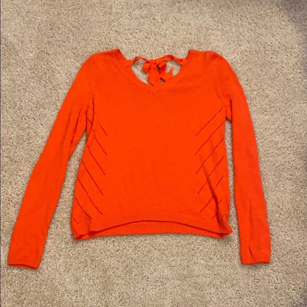 Orange v-neck sweater with tie back